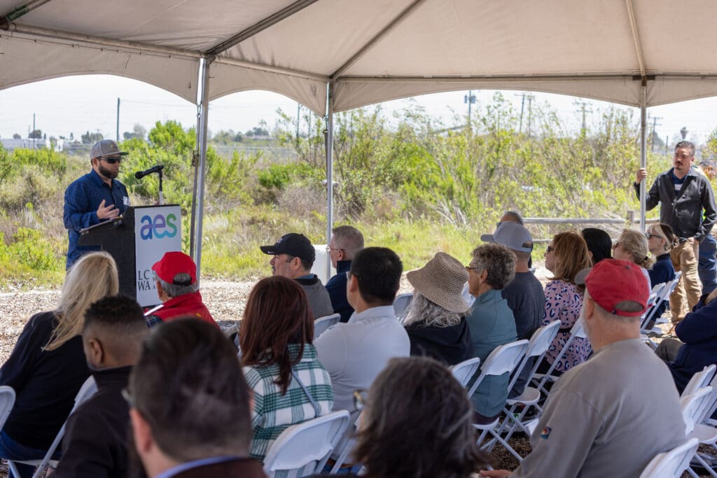 person giving speech to audience